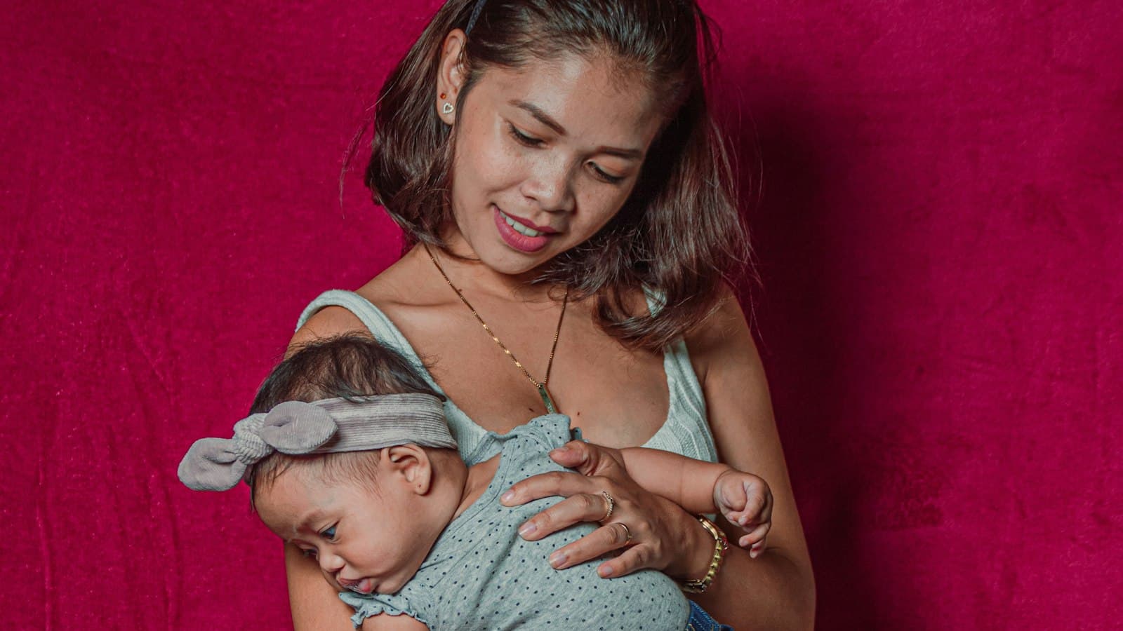 A Filipina mother cradling her baby
